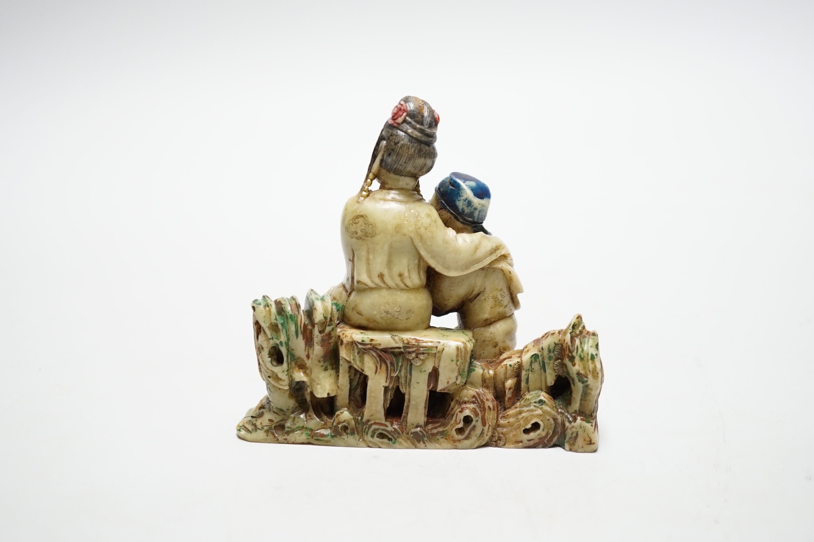 A Chinese soapstone carving - two figures, 19th/20th century, 9.5cm tall